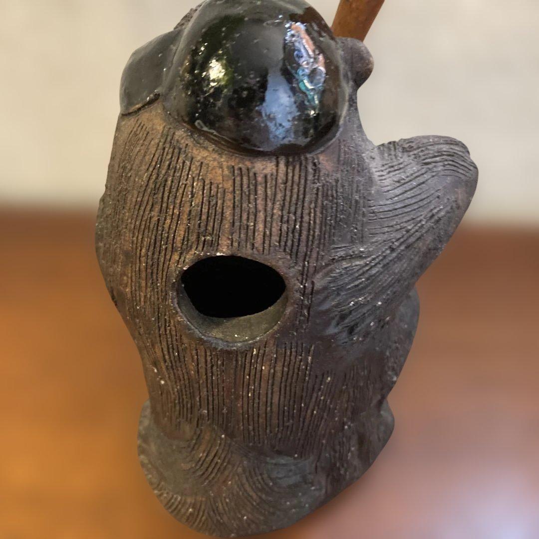 名門　狸庵の珍しいバットを持ったキュートなお目目のタヌキ君の置物です。