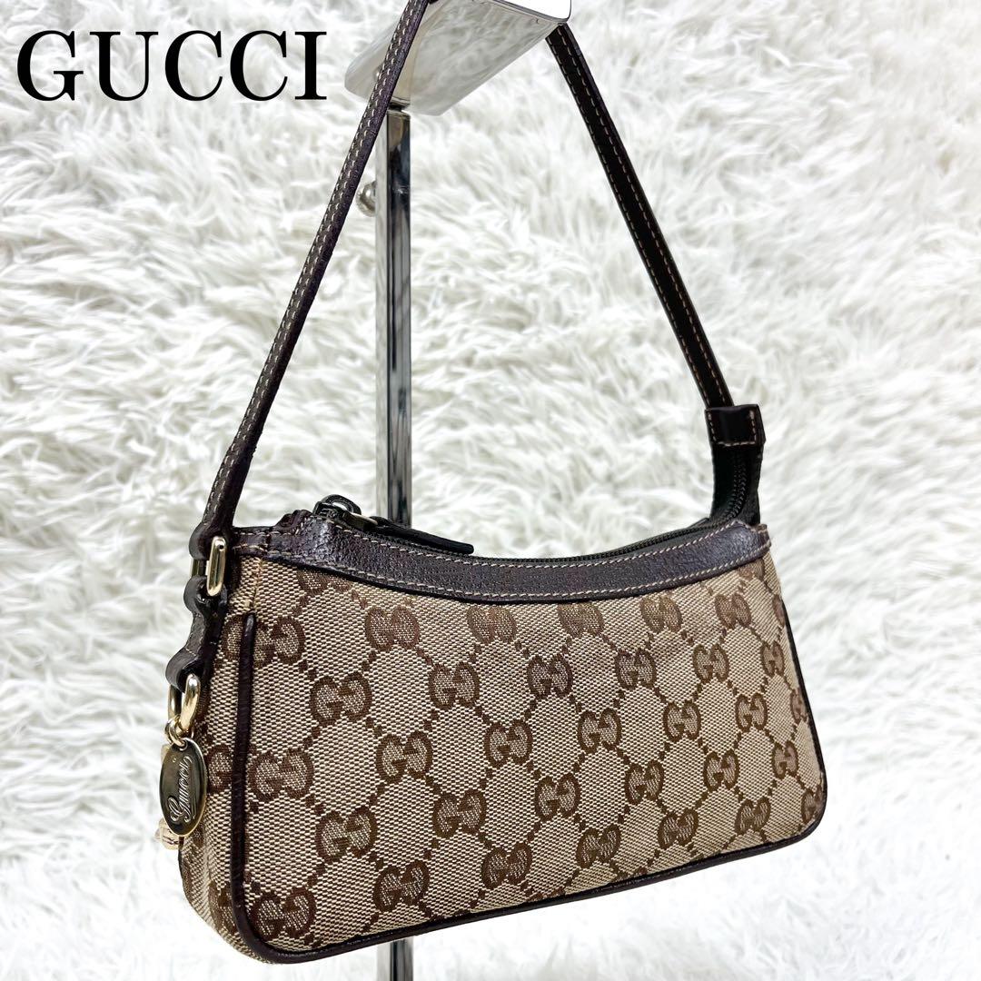 希少 グッチ アクセサリーポーチ ブーツチャーム GGキャンバス レザー