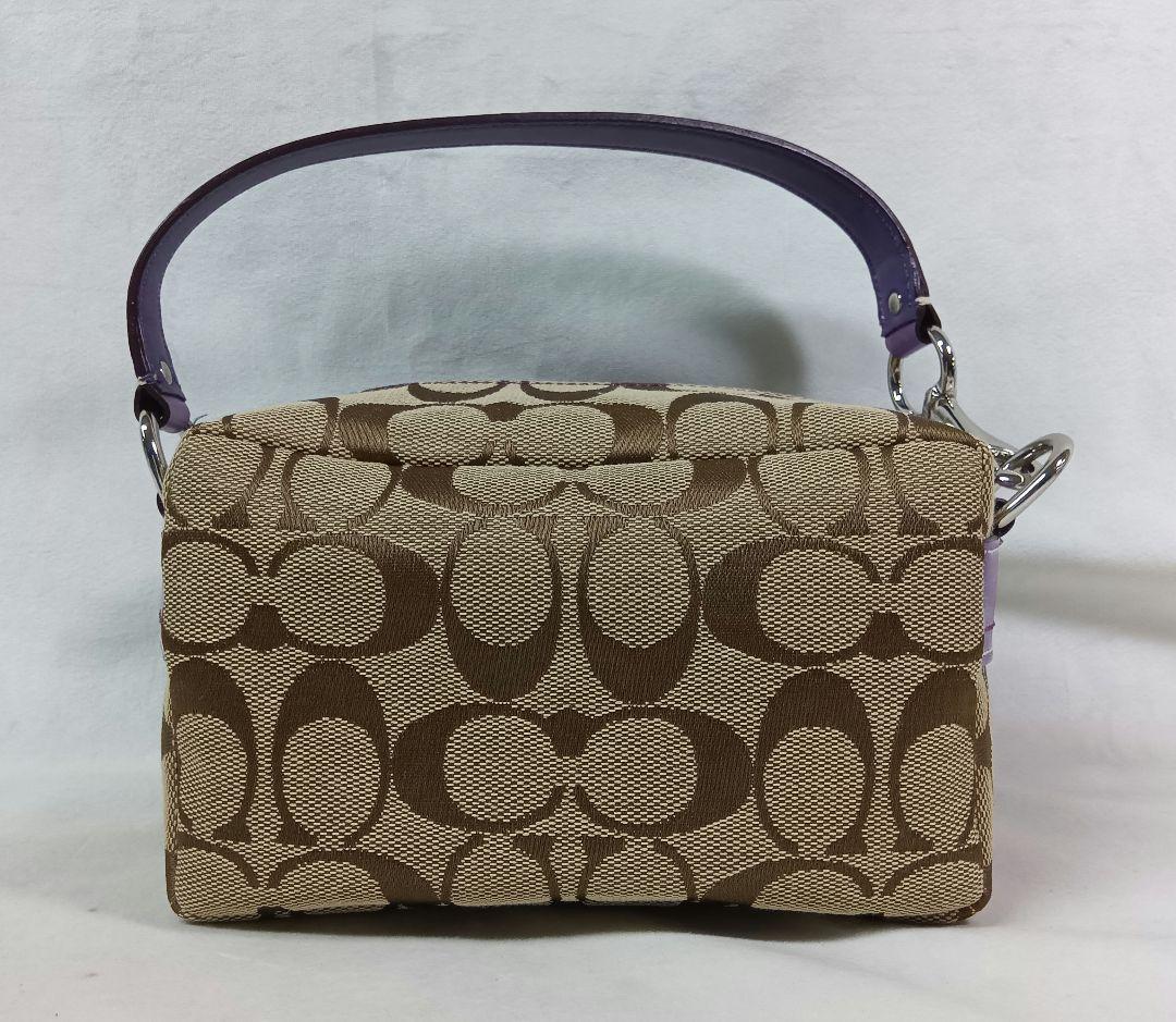 COACH(コーチ) ポーチ　ハンドバッグ　シグネチャー柄　ダブルターンロック
